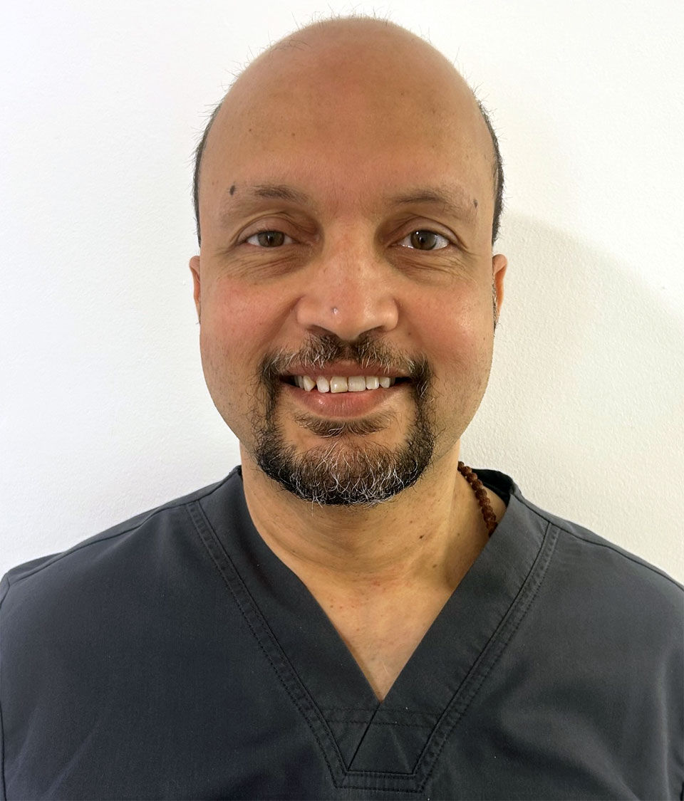 Dentist Balaji Reguna